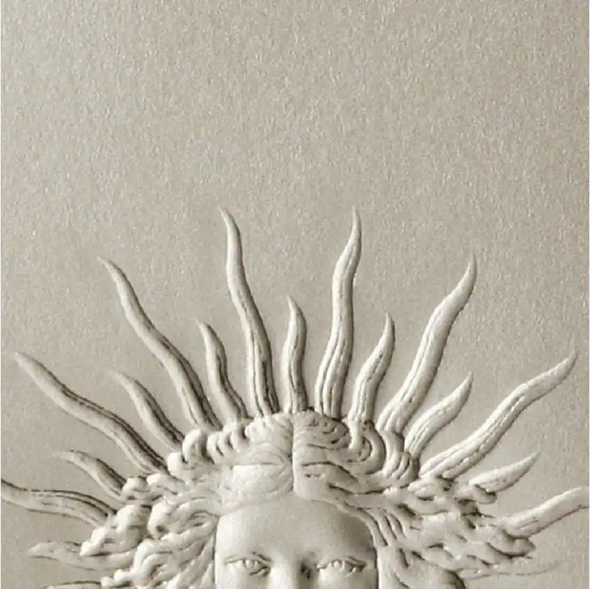 Artistic sculpture of a sun goddess with flowing rays, created by Eva Broda.